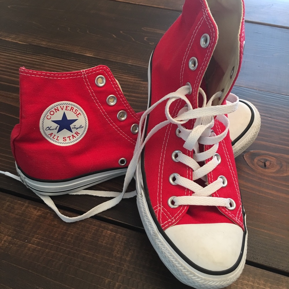 Red high top converse.